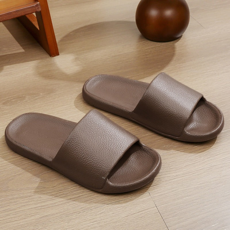 EVA shit-stepping couple home bath slippers